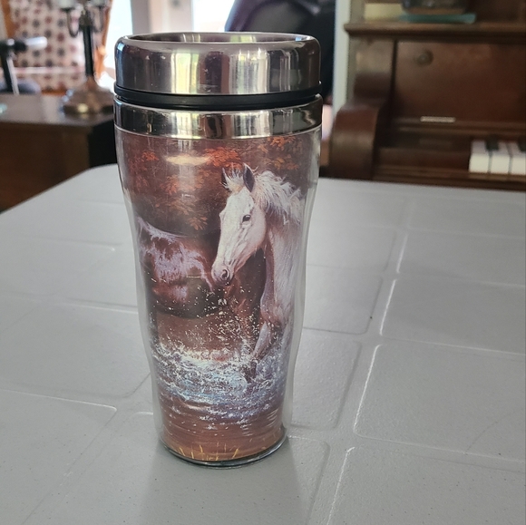 A travel coffee mug. In good condition. - Picture 1 of 5